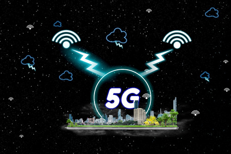 5G network interface and icon concept, tablet with city model on sky at nightの写真素材