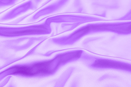 proton purple satin fabric texture soft blur backgroundの写真素材