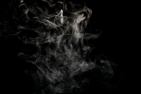 Abstract powder or smoke isolated on black backgroundの写真素材