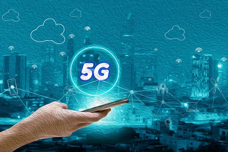 Abstract cyan-teal oil paint with 5G network interface and icon concept,hand holding mobile smart...