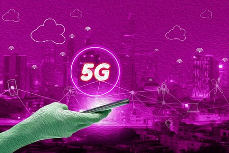 Abstract pink oil paint with 5G network interface and icon concept,hand holding mobile smart phone with cityscape textured backgroundの写真素材