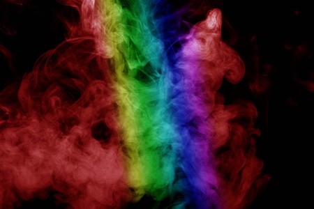 Abstract smoke isolated on black background,Rainbow powder