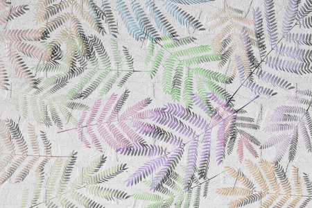 colorful leaves pattern on white wall texture,gradient color pastel autumn leaf,ideas graphic design for web or bannerの写真素材