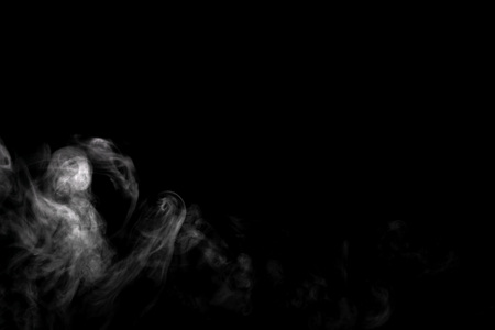 Abstract powder or smoke effect isolated on black backgroundの写真素材