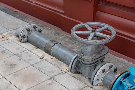 Industrial water valve on floor