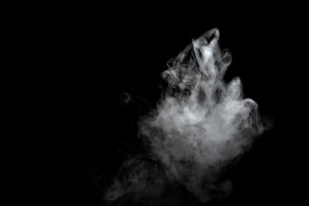 Abstract powder or smoke effect isolated on black backgroundの写真素材