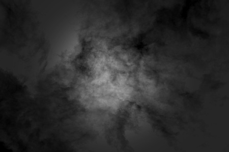 white cloud and black sky textured backgroundの写真素材