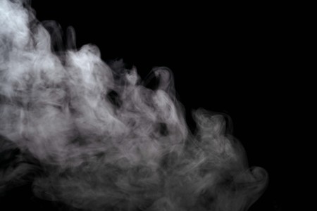 Abstract powder or smoke effect isolated on black background,Out of focusの写真素材