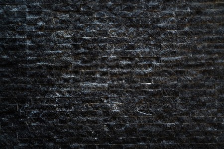 black brick wall construction for background