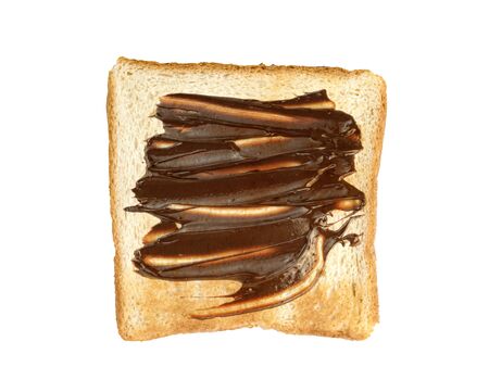 Toasted slice bread with chocolate spread isolated on white backgroundの写真素材
