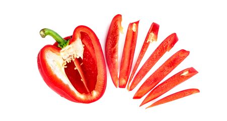 red chopped sweet bell pepper isolated on white backgroundの写真素材