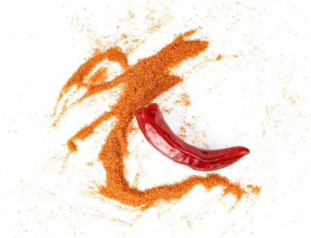 Red ground paprika powdered and dry chili pepper isolated on whiteの写真素材