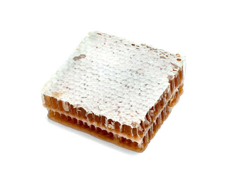 Fresh Honeycomb slice and honey isolated on white backgroundの写真素材