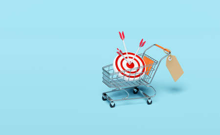 stainless steel shopping cart with target red darts or arrow isolated on blue background,shopping...