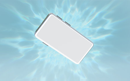 water dropping smartphone, mobile phone falls into water with bubble, water splash isolated on blue background. cell phone damaged, 3d illustration render, top viewの写真素材