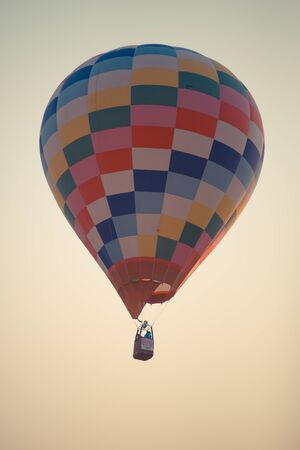 Colorful hot air balloon flying overの写真素材