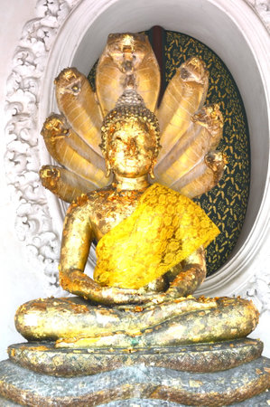 Buddha with seven-headed naga snakes, Nakhon Pathom province, Thailandの写真素材