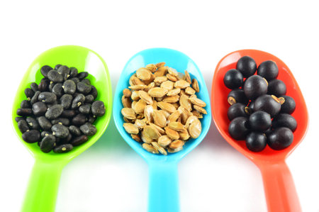 Fruit and vegetable seed in spoonの写真素材