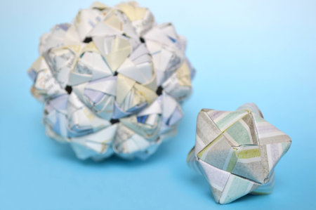 Modular origami, sonobe ball, on blue backgroundの写真素材