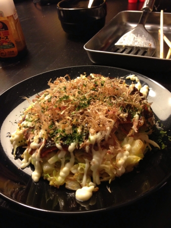 Freshly prepared Japanese Okonomiyaki Freshly prepared Japanese Okonomiyaki