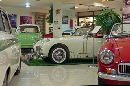 QAWRA - JULY 13  Old car inside the Malta Classic Car Collection, a fascinating museum located in Bugibba  Malta   This museum exhibits automobiles, motorbikes, juke boxes, old TV-sets, gramophones and so on のeditorial素材