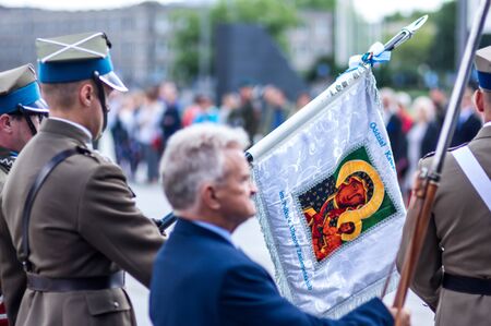Military banner of an old cavalry unit presented during a patriotic event in Poland's capital