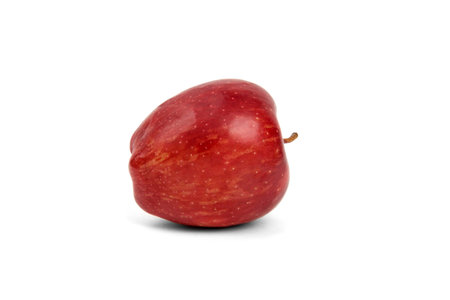 red ripe apples on a white backgroundの写真素材