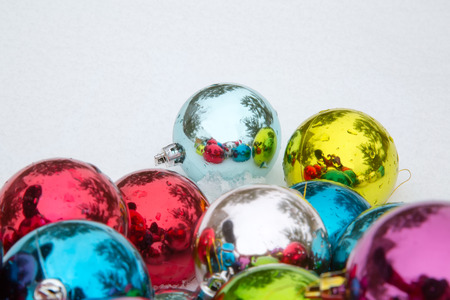 Christmas decorations on snowの写真素材