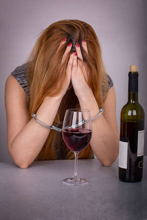The concept of female alcohol addictionの写真素材