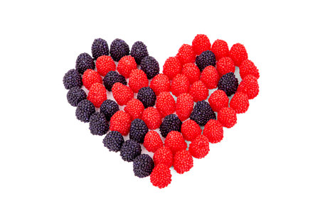 Heart of marmalade raspberries and blackberries, isolated on a white background