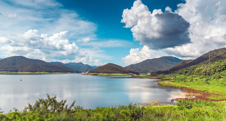 Mirror Lake and mountain with blue sky cloud in reservoirの写真素材