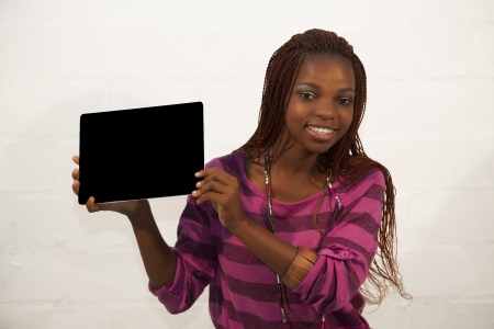 African Woman Holding a Blank black Sign against white backgroundの写真素材