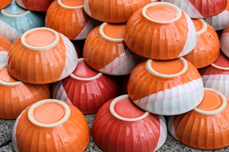 Orange bowl ceramic at the warehouse.の写真素材