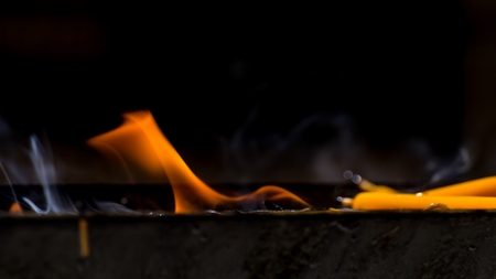 Candles were burning on the shelves.の写真素材