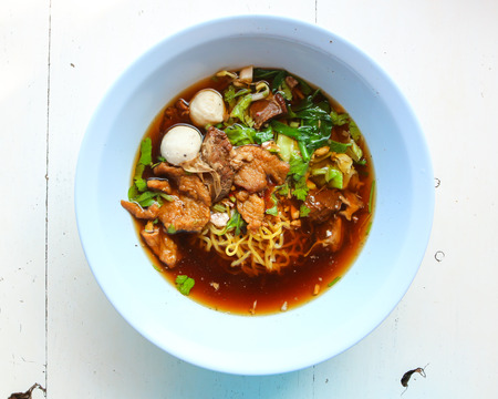 bowl of thai style beef noodle soup.