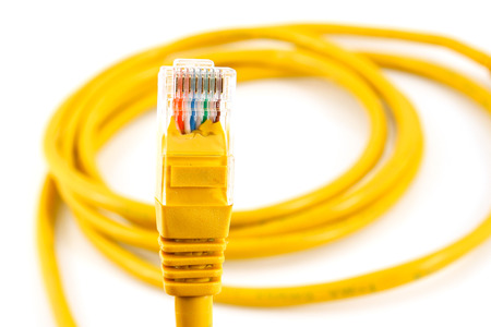 Network cable with RJ45 isolate on white background.