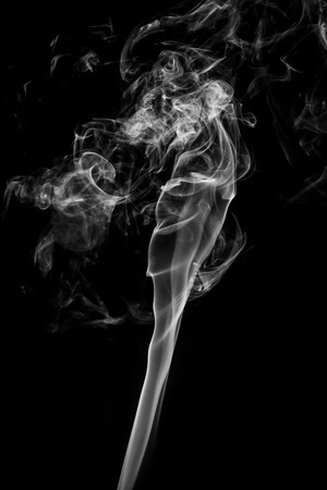 Abstract white smoke on black background.の写真素材