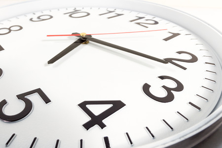 Clock or time abstract background. white clock with red and black needles