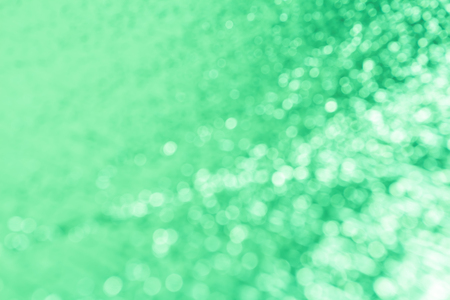 green background with bokeh.の写真素材