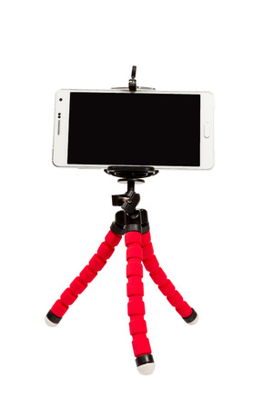 Isolated of Smart Phone on tripod on white background.の写真素材