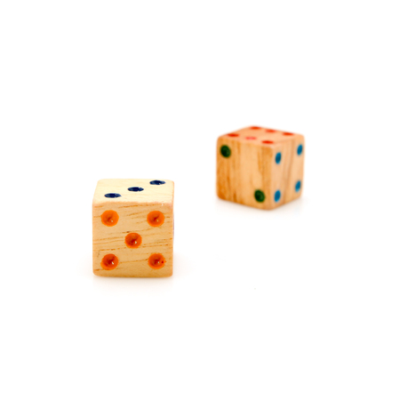 Wooden dice for board game isolated on white background.