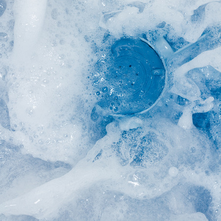 Bubble caused by washing as background.の写真素材