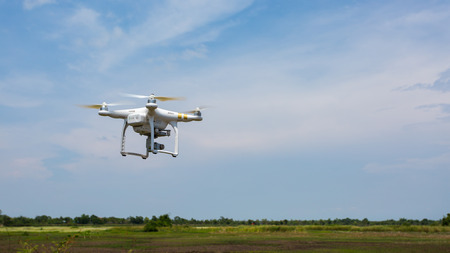 Udon Thani ,Thailand- MAY 18, 2016: White remote controlled Drone Dji Phantom  equipped with high...