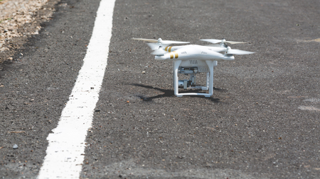 Udonthani, Thailand - May 18,2016 : white drone with mounted digital camera for video and photo...