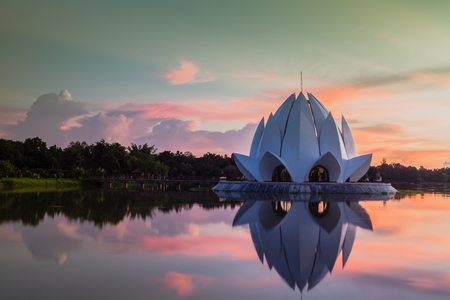Udon Thani, THAILAND - Sep 16, 2016 : Reflection of chapel at twilight time in Thailand,A place for meditation in Buddhism.のeditorial素材