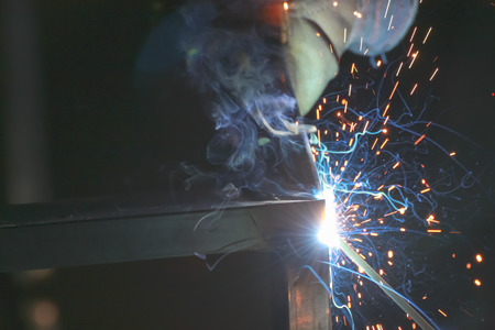 welding steel with sparks lighting.