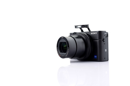 UdonThani ,Thailand  - June 20,2016: Photo of Sony Cyber-shot DSC-RX100 mk iv,  digital photo camera on a white background.のeditorial素材