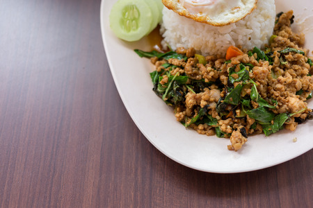 Close up rice with stir fried minced pork and basil.の写真素材
