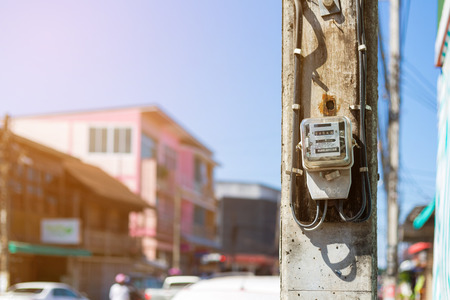 Electric meters at pole in Thailand.の写真素材