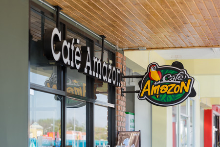 Udon Thani, Thailand - December 21, 2016: Cafe Amazon logo sign. Thai frachise coffee in Thailandのeditorial素材